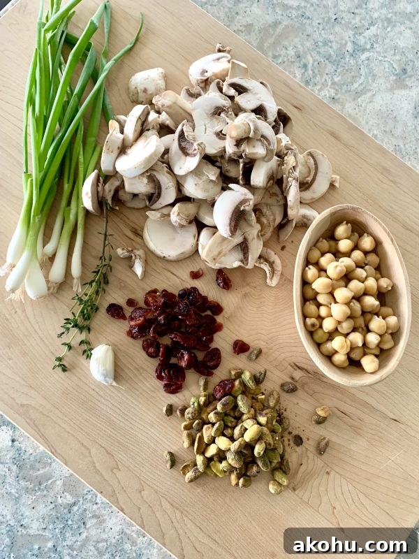 Honeynut Squash Stuffed with Mushrooms, Chickpeas, Pistachios & Cranberries 6 Honeynut Squash Stuffed with Mushrooms, Chickpeas, Pistachios & Cranberries via LizsHealthyTable.com #vegan #vegetarian