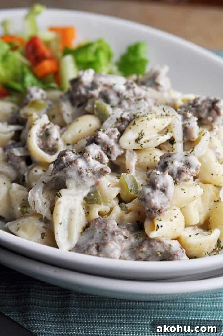 Philly Cheesesteak Casserole with Ground Beef and Melted Provolone 2 Ground beef cheese and shells with salad