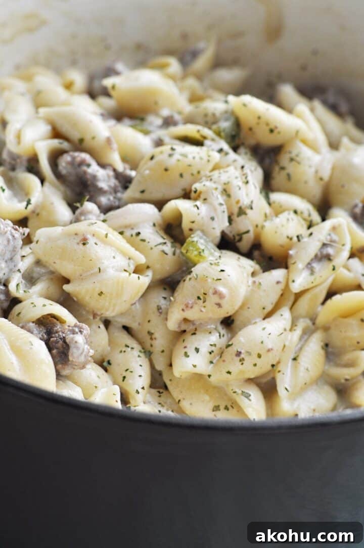 Philly Cheesesteak Casserole with Ground Beef and Melted Provolone 3 Cheesesteak Pasta Dish cooking