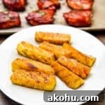 A platter of smoked pineapple spears, beautifully caramelized.
