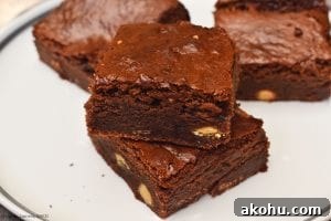 Condensed Milk Brownies. Super chewy, fudgy and dense chocolate brownies using condensed milk as the base. #condensedmilkdessert #condensedmilkbrownies #chewybrownies #fudgybrownies #condensedmilkfudge #qucikandeasyfudge
