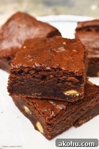 Condensed Milk Brownies. Super chewy, fudgy and dense chocolate brownies using condensed milk as the base. #condensedmilkdessert #condensedmilkbrownies #chewybrownies #fudgybrownies #condensedmilkfudge #qucikandeasyfudge