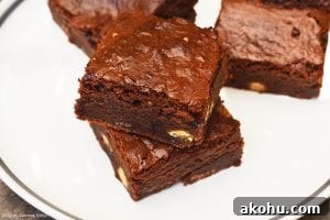 Condensed Milk Brownies. Super chewy, fudgy and dense chocolate brownies using condensed milk as the base. #condensedmilkdessert #condensedmilkbrownies #chewybrownies #fudgybrownies #condensedmilkfudge #qucikandeasyfudge