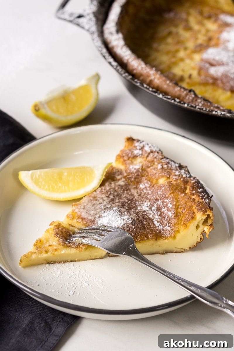 Slice of dutch pancake on plate