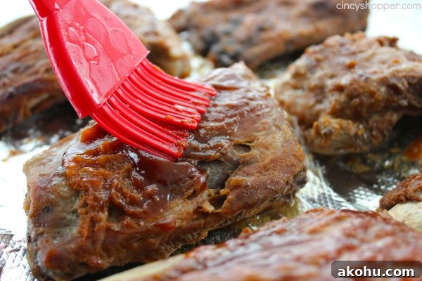 Apple BBQ Slow Cooker Ribs — Tender Fall-Off-The-Bone Recipe 13 Slow Cooker Apple BBQ Ribs - apple flavors to our ribs along with some sweet brown sugar flavors to give these ribs a yummy kick. Great Crock-Pot meal idea.
