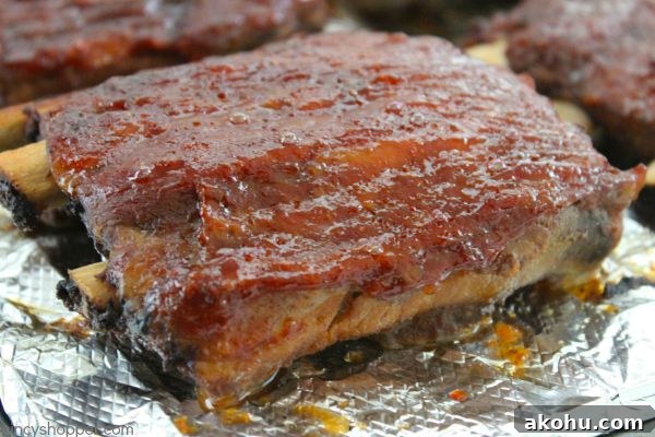 Apple BBQ Slow Cooker Ribs — Tender Fall-Off-The-Bone Recipe 14 Slow Cooker Apple BBQ Ribs - apple flavors to our ribs along with some sweet brown sugar flavors to give these ribs a yummy kick. Great Crock-Pot meal idea.
