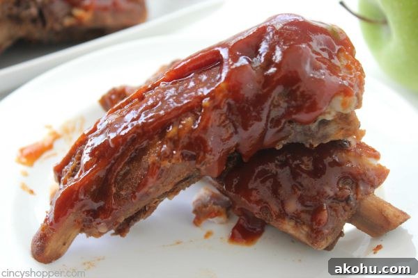 Apple BBQ Slow Cooker Ribs — Tender Fall-Off-The-Bone Recipe 15 Slow Cooker Apple BBQ Ribs - apple flavors to our ribs along with some sweet brown sugar flavors to give these ribs a yummy kick. Great Crock-Pot meal idea.