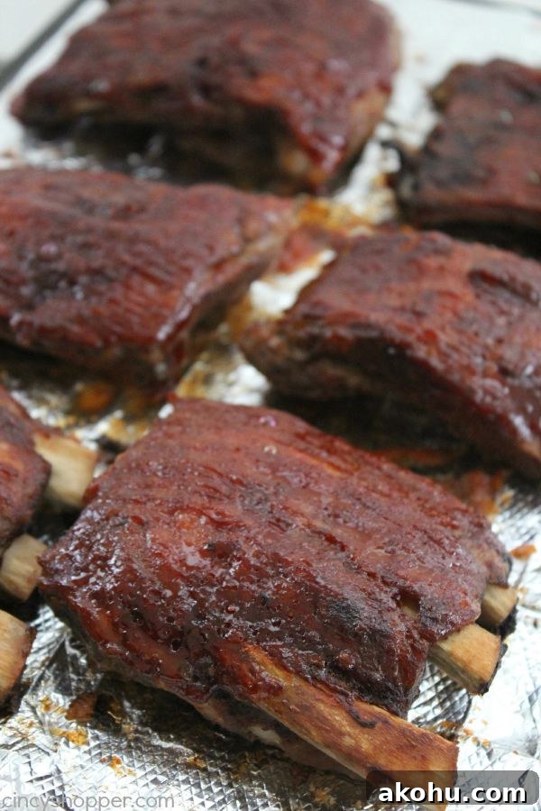 Apple BBQ Slow Cooker Ribs — Tender Fall-Off-The-Bone Recipe 3 Slow Cooker Apple BBQ Ribs - apple flavors to our ribs along with some sweet brown sugar flavors to give these ribs a yummy kick. Great Crock-Pot meal idea.