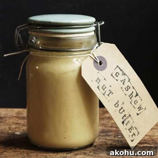 Oil-Free Homemade Cashew Butter Recipe — Smooth & Creamy 4 close up of jar of cashew butter
