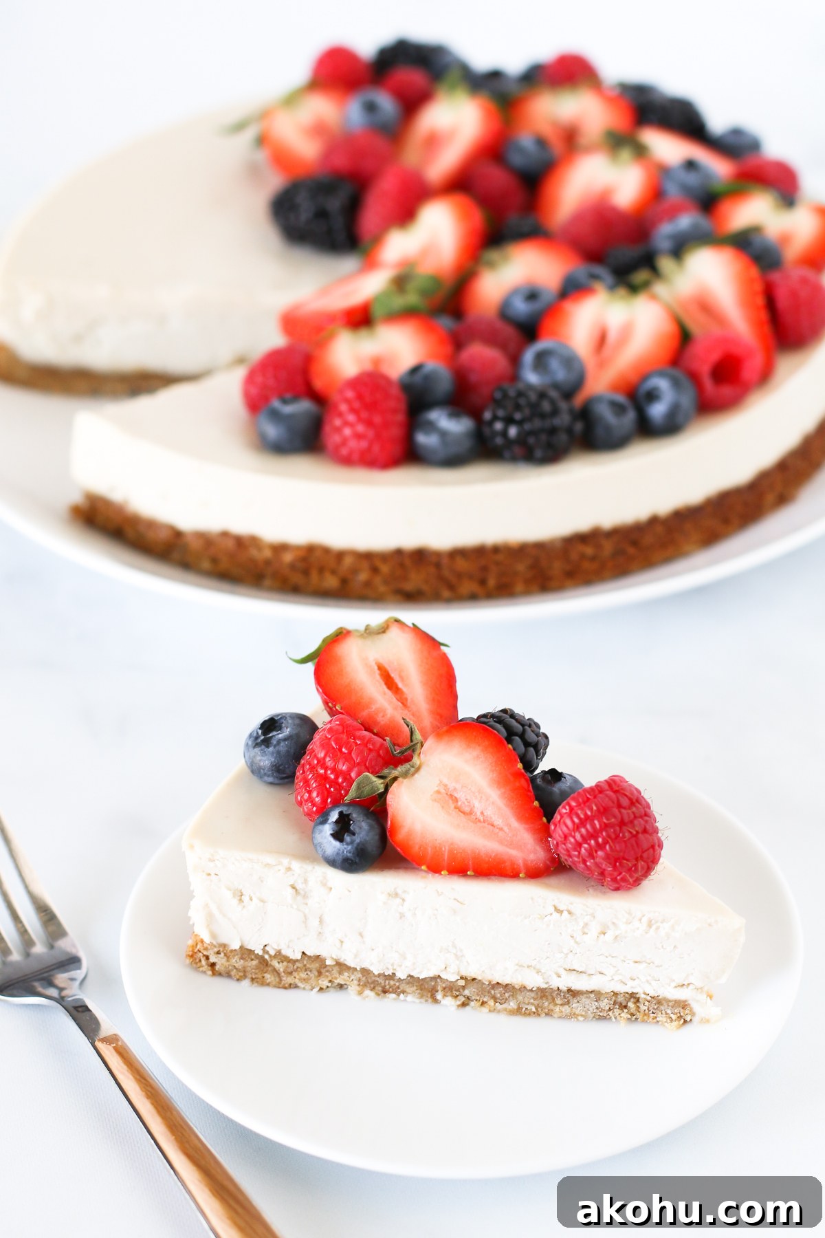 Gluten Free Vegan Berry Cheesecake. You will go head over heals for this dairy free cheesecake! Made with cashews, the creamy texture is perfectly paired with the fresh berries.