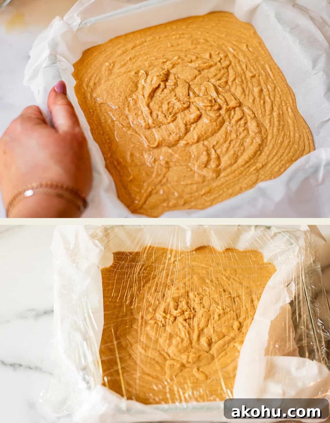 Top: A hand holds a pan lined with parchment paper filled with peanut butter fudge. Bottom: The same pan, now covered with clear plastic wrap, sits on a marble surface.