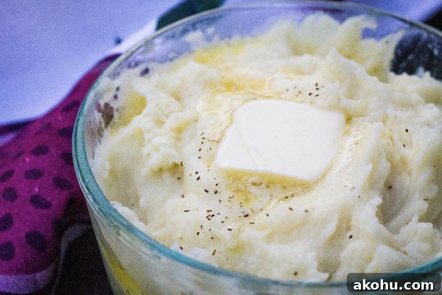 Reheat Mashed Potatoes in an Instant Pot: Quick, Moist Results 3 Glass Pyrex dish of mashed potatoes with melted butter that has been reheated in the Instant Pot