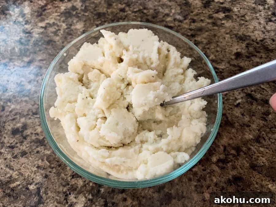 Reheat Mashed Potatoes in an Instant Pot: Quick, Moist Results 6 Mashed potatoes in a glass bowl, fluffed for reheating in the Instant Pot