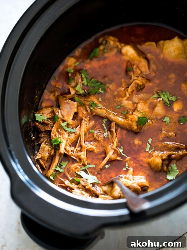 Chipotle pulled pork in a slow cooker.