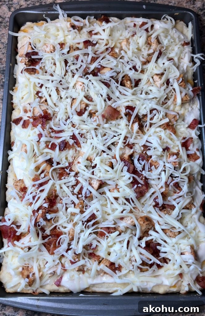Chicken Bacon Alfredo Pizza on Cheddar Bay Biscuit Crust 18 Chicken Bacon Alfredo Pizza on Cheddar Bay Biscuit Crust