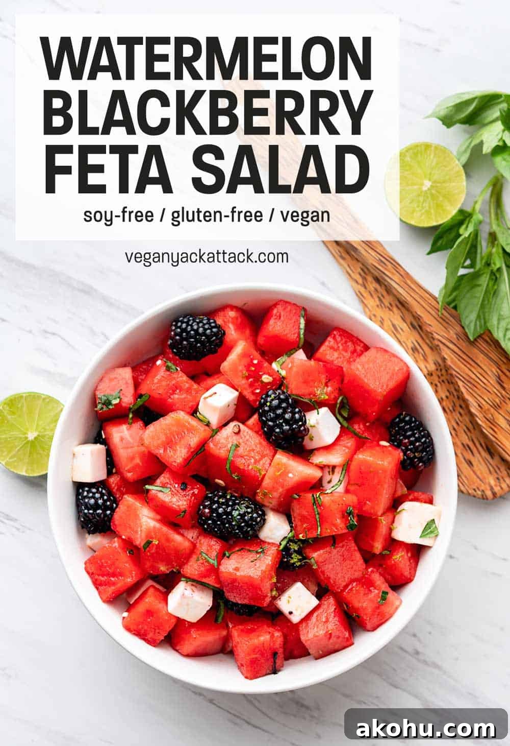 Large white bowl filled with fruit salad with overlay text reading 'Watermelon Blackberry Feta Salad'