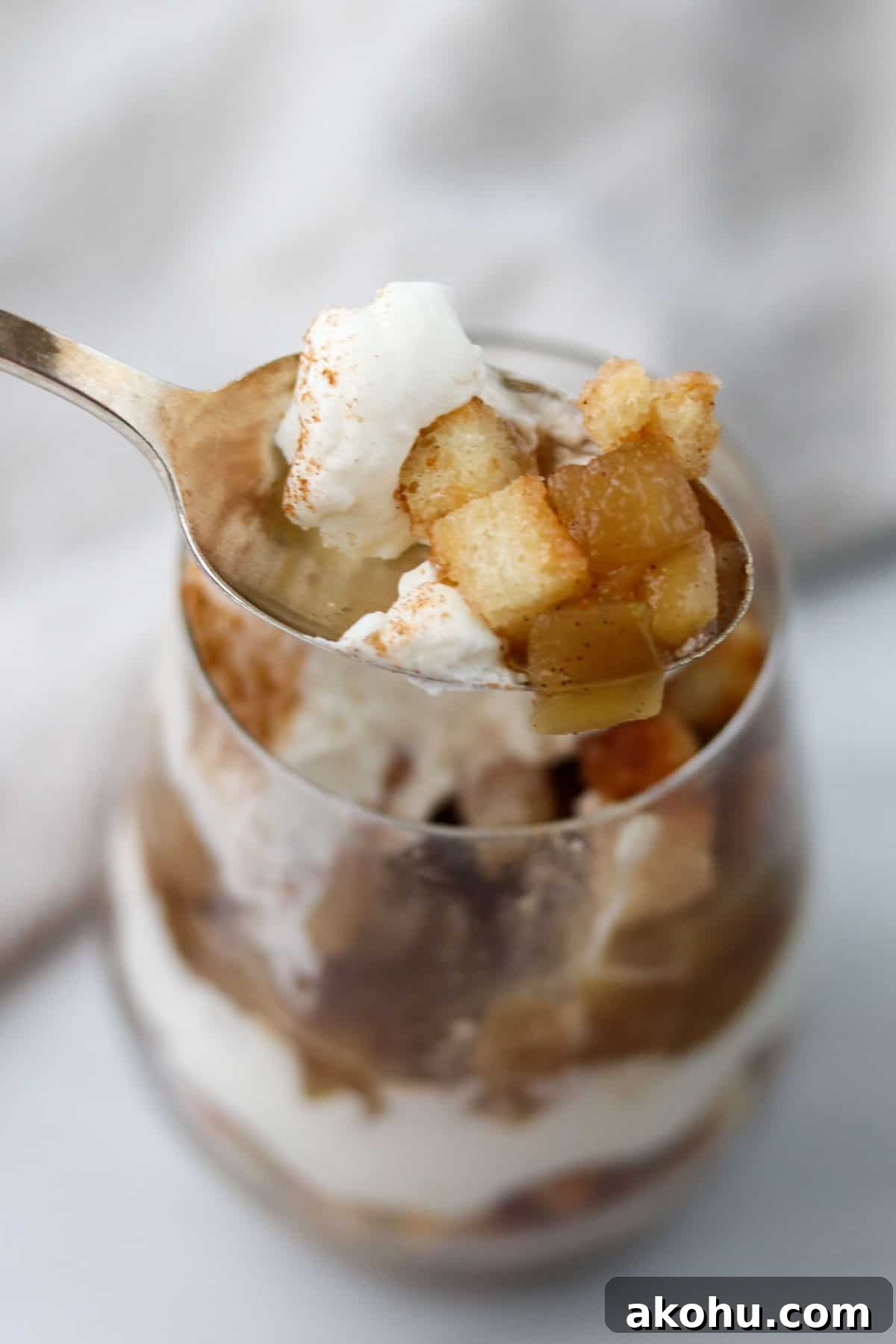 Spoonful of apple trifle.