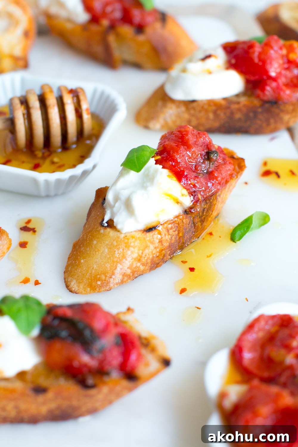 Tomato Confit & Burrata Crostini is the ultimate way to preserve those bright and sunny summer tomatoes