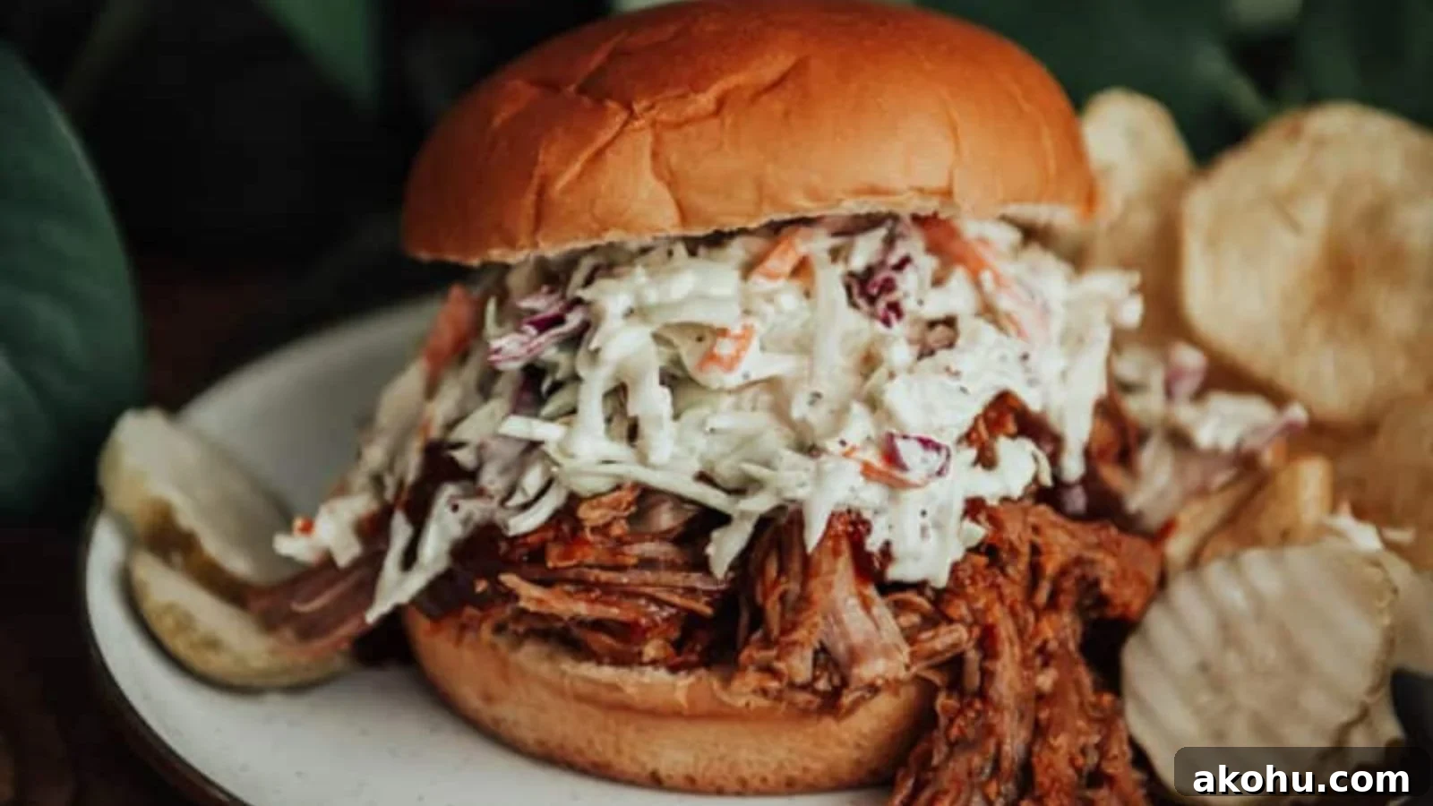 Pulled pork slow cooked until it shreds easily for sandwiches or tacos.