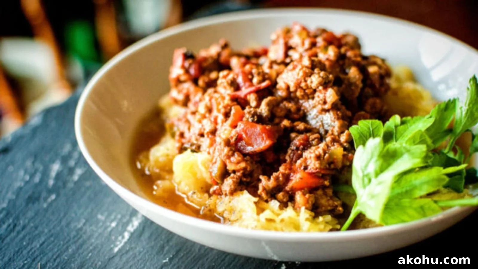 Slow cooker bolognese simmered into a thick, hearty meat sauce.