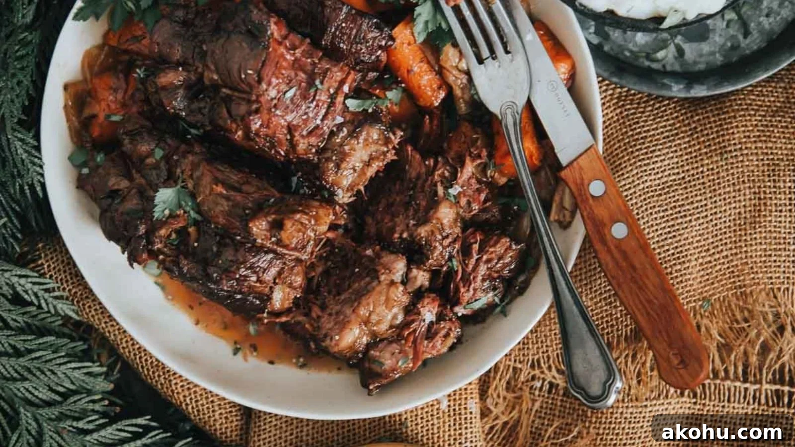 Slow cooker pot roast with tender beef and vegetables in rich broth.