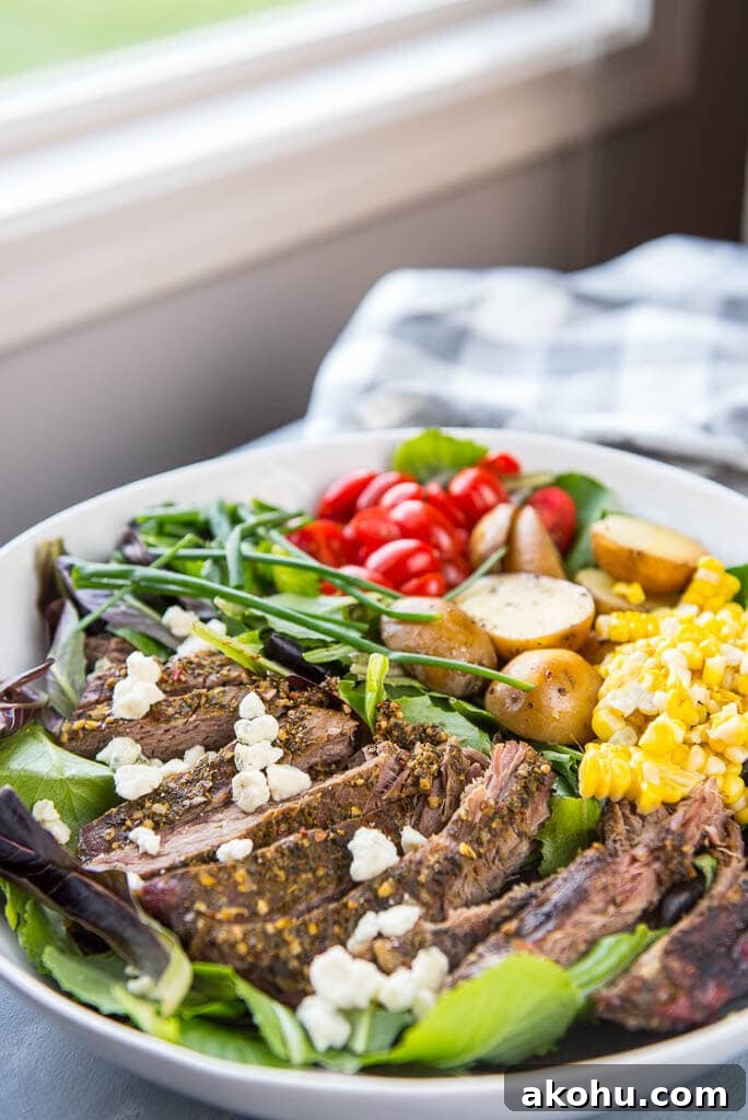 Slow-Cooked Steak Salad with Warm Vegetables and Tangy Dressing 2 Slow Cooker Hearty Steak Salad is a simple and fresh meal that makes it easy to eat healthy even on busy summer nights!