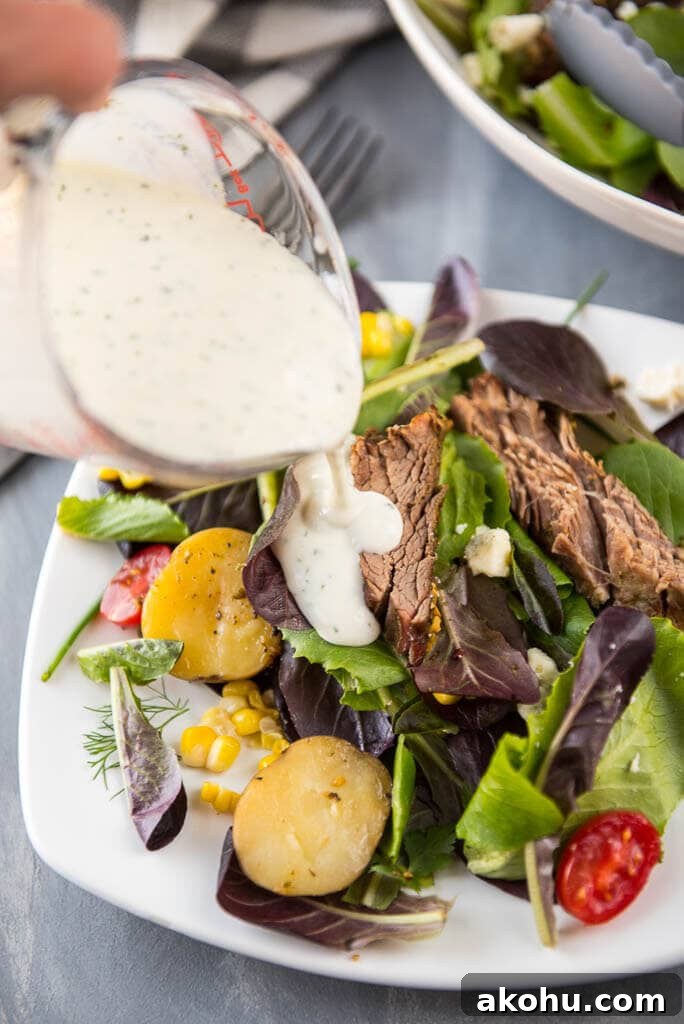 Slow-Cooked Steak Salad with Warm Vegetables and Tangy Dressing 5 Slow Cooker Hearty Steak Salad is a simple and fresh meal that makes it easy to eat healthy even on busy summer nights!