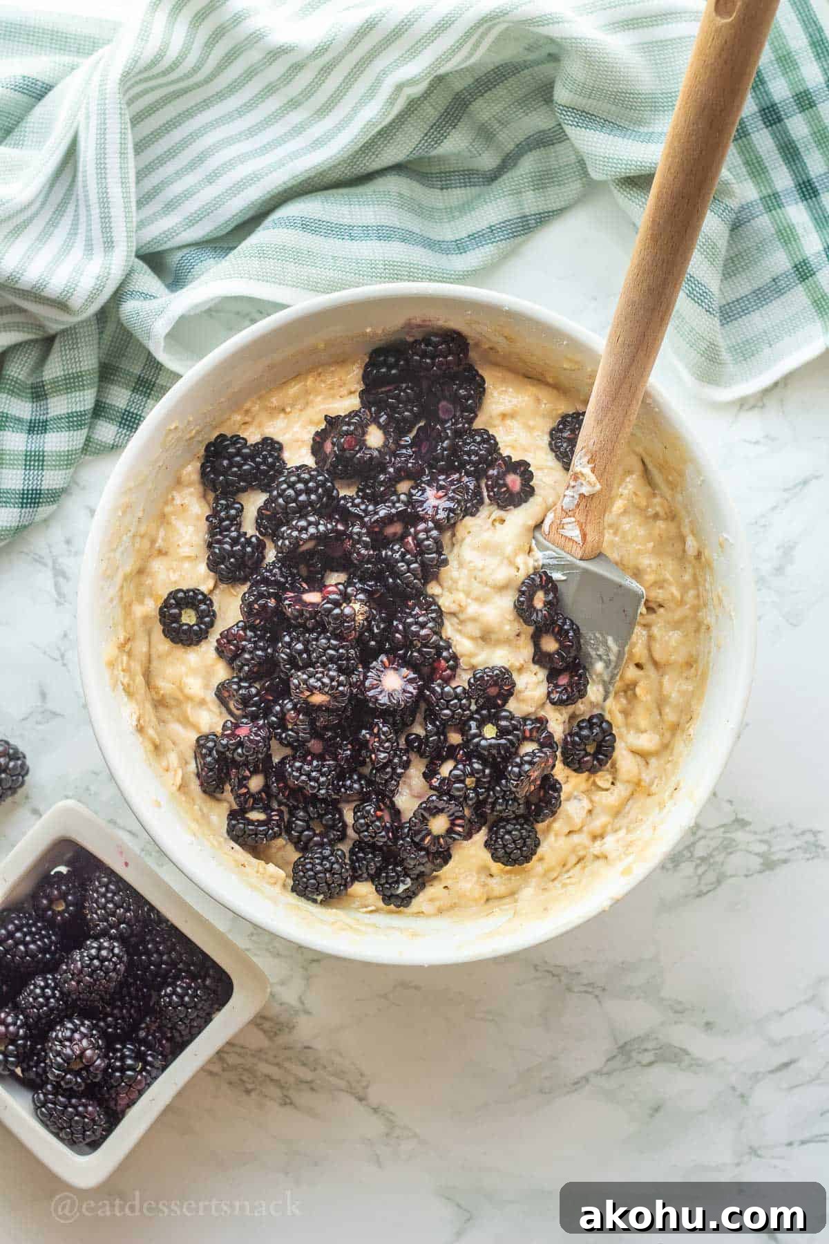 Banana Blackberry Oatmeal Muffins Recipe — Quick Baked Breakfast 8 Blackberries in raw banana oat muffin batter.