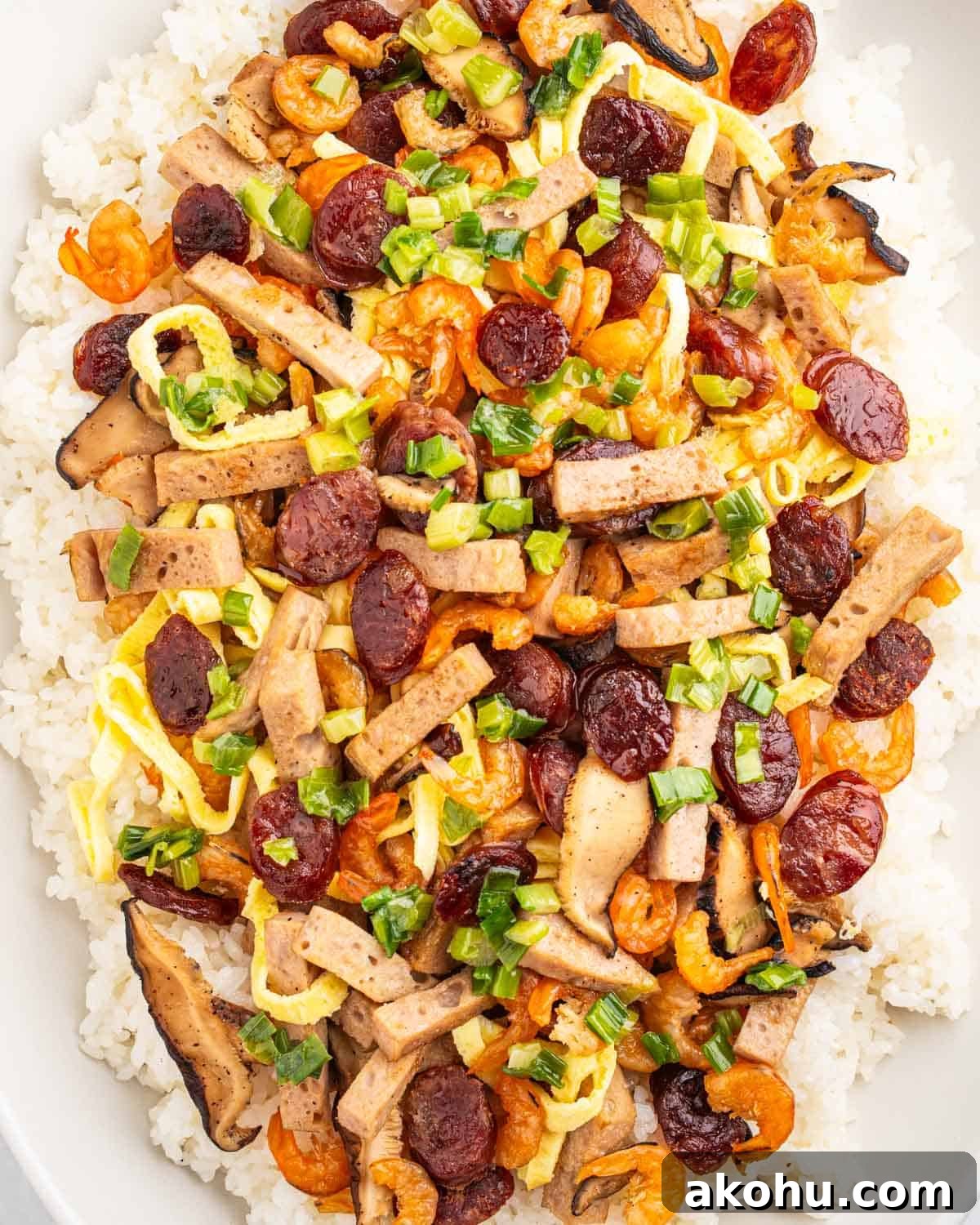serving plate of vietnamese sticky rice xoi man with toppings.