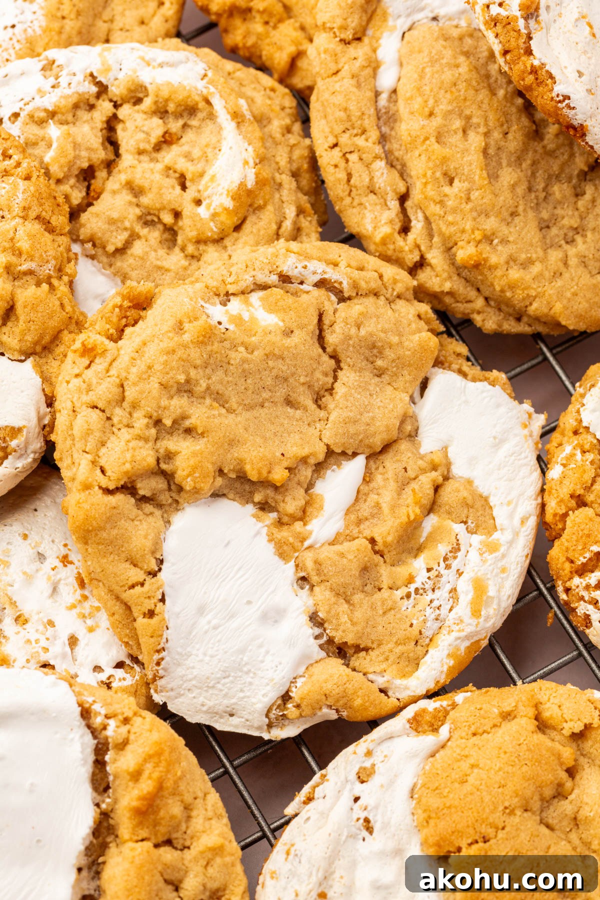 Close up image of gluten-free fluffernutter cookies on a cooling rack.