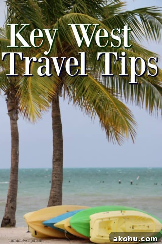Key West Travel Tips over kayaks next to palm trees on the beach 