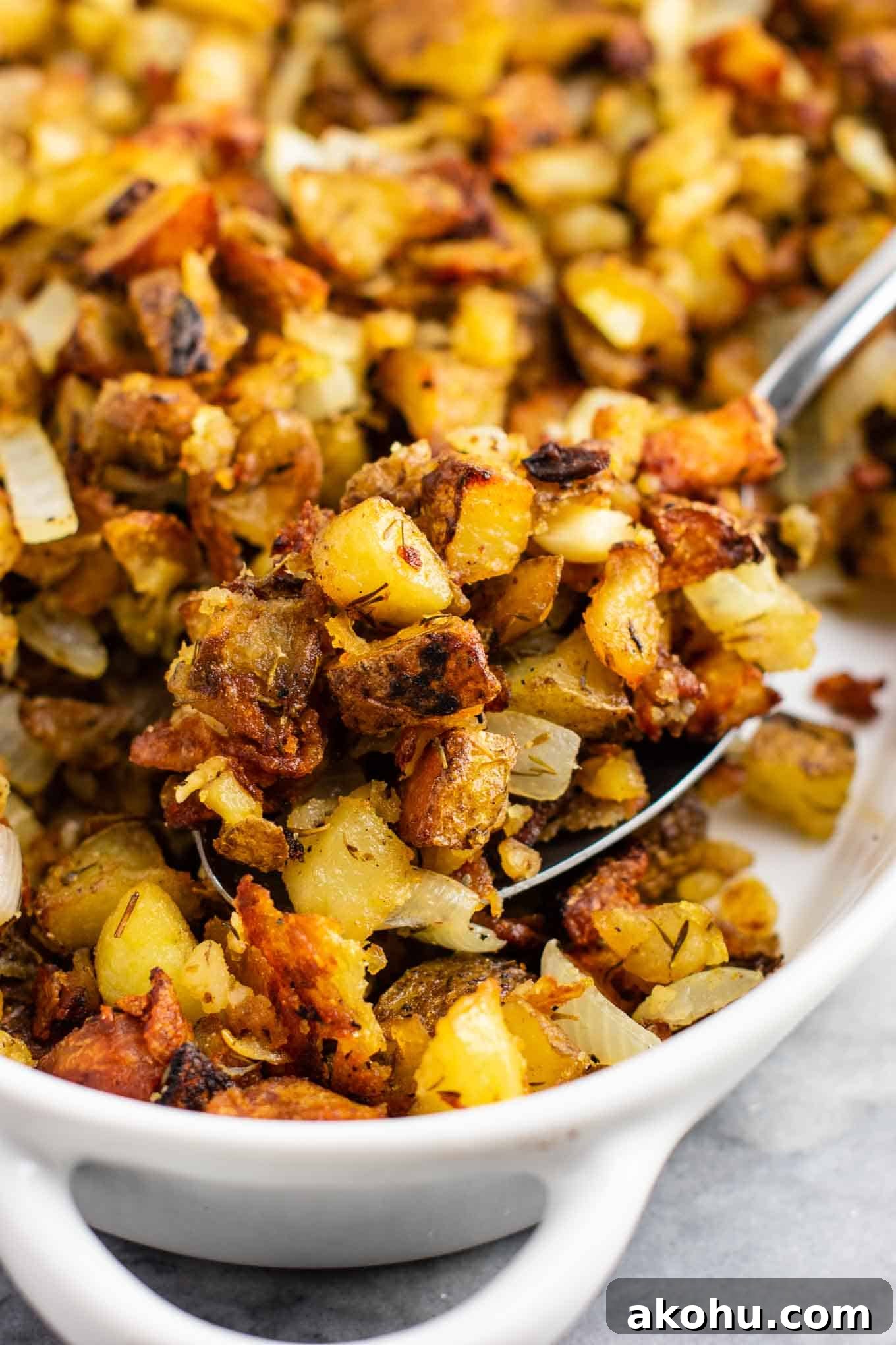 This famous crispy potato casserole is SO GOOD! Perfectly crispy potatoes slow roasted to perfection. One of the best vegan potato recipes! #potatocasserole #vegan #veganpotatorecipes #dinner #potatoes #healthy