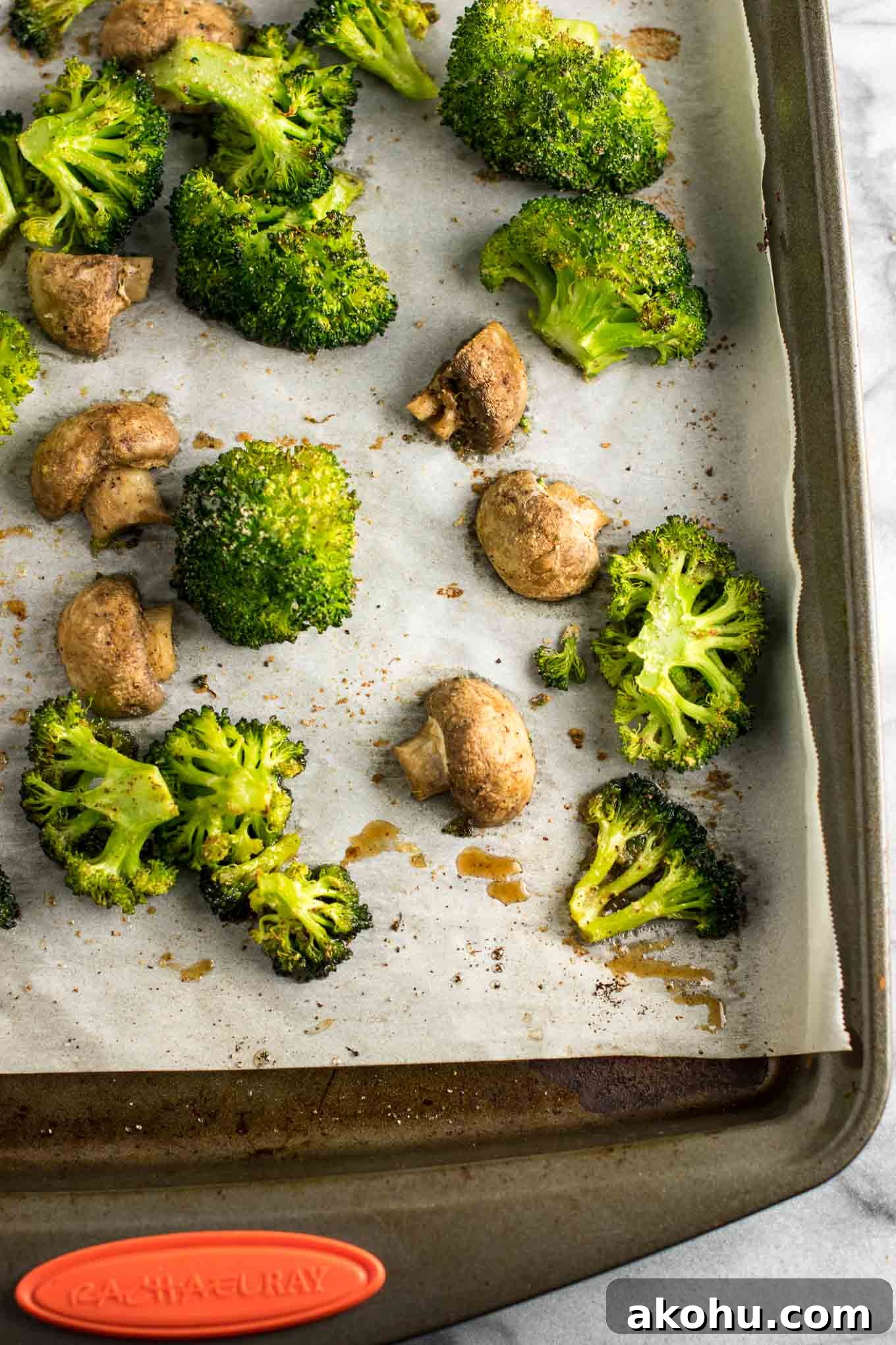 Roasted broccoli and mushrooms recipe - easy side dish! This was so easy and really good. We will be making it a lo! #broccoliandmushrooms #vegan #sidedish #dinner #glutenfree #broccoli #mushrooms #easysidedish #mushrooms