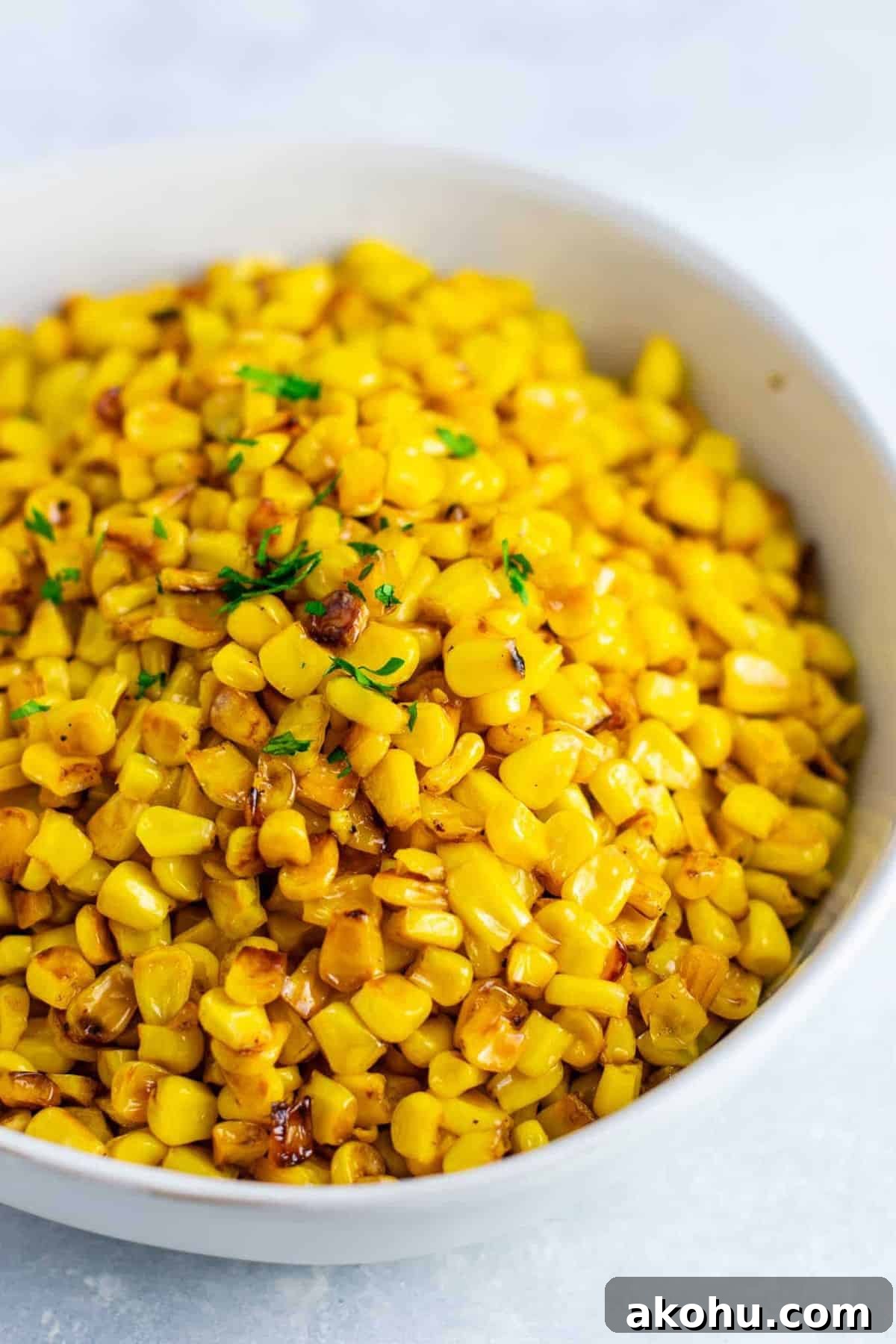 Best skillet corn recipe –the BEST side dish and even corn haters will love it. you will never make corn a different way after you try this! #skilletcorn #sidedish #dinner #dinnerrecipe #glutenfree #corn #easysidedish