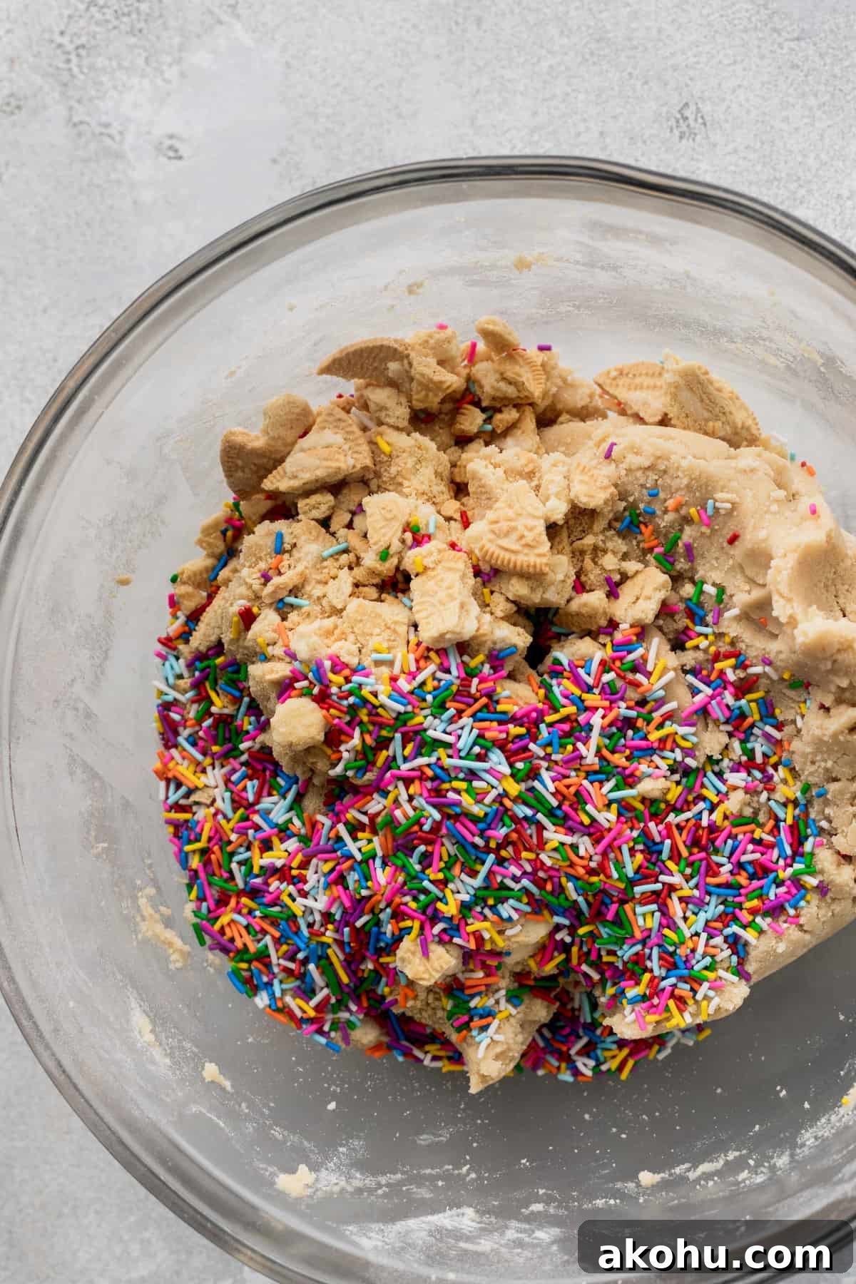 Sprinkles and golden oreos added to the cookie dough.