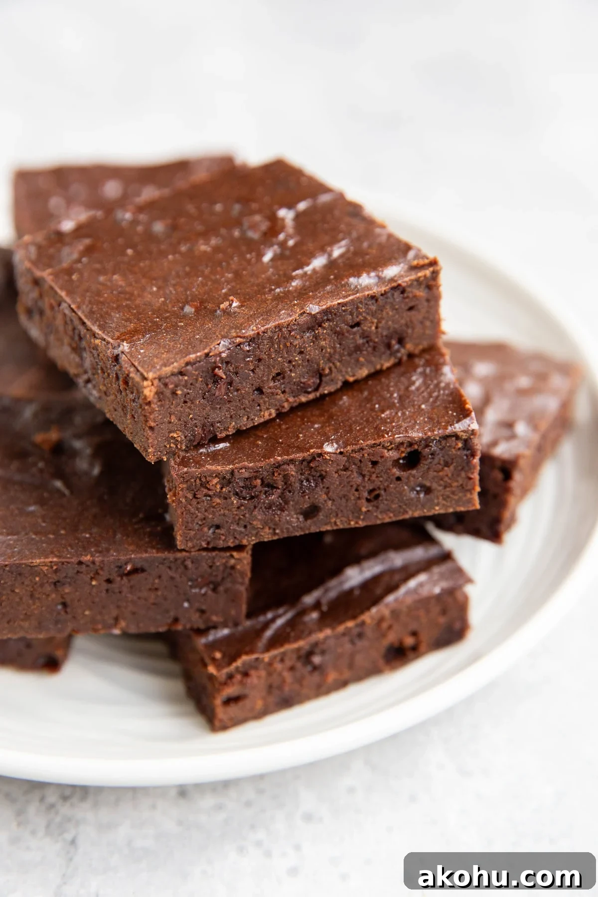 Plate of cottage cheese brownies cut into slices.