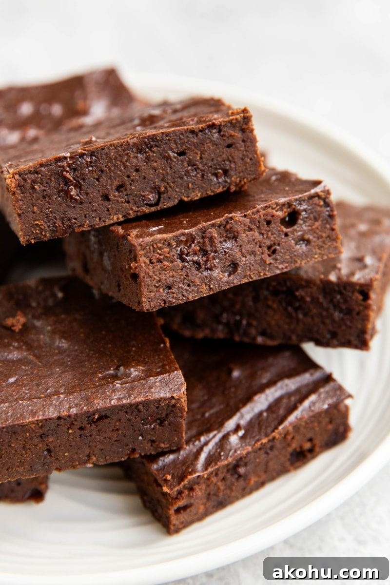 Plate of cottage cheese brownies cut into squares.