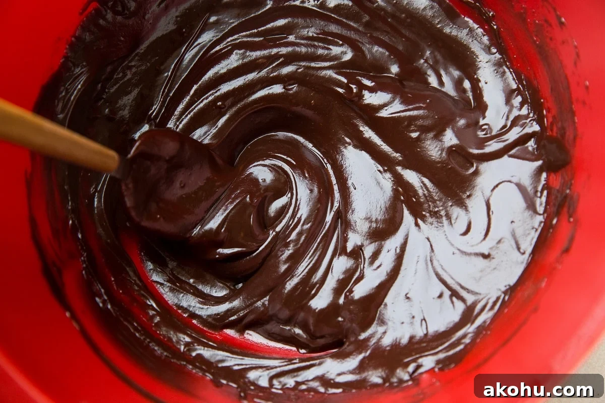 Chocolate ganache in a mixing bowl.