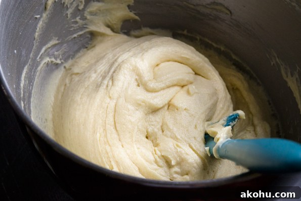 Pound cake dough in bowl with spatula