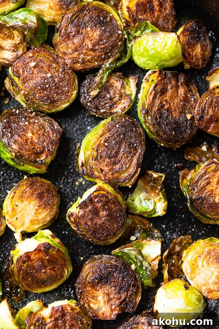 Crispy Pan-Fried Brussels Sprouts Recipe with Garlic 5 brussels sprouts fried in a skillet