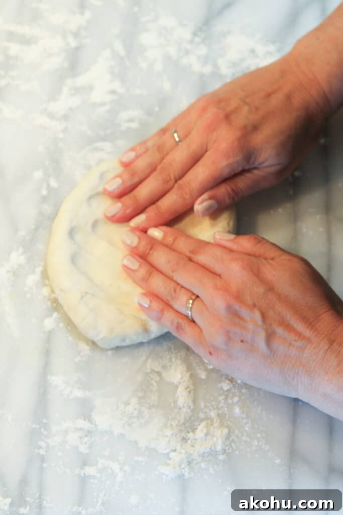 press dough to form circle for pizza