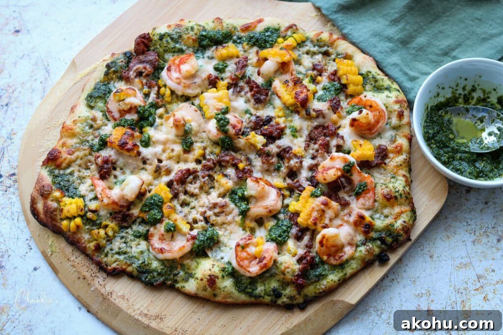 horizontal image of homemade chorizo and shrimp pizza 