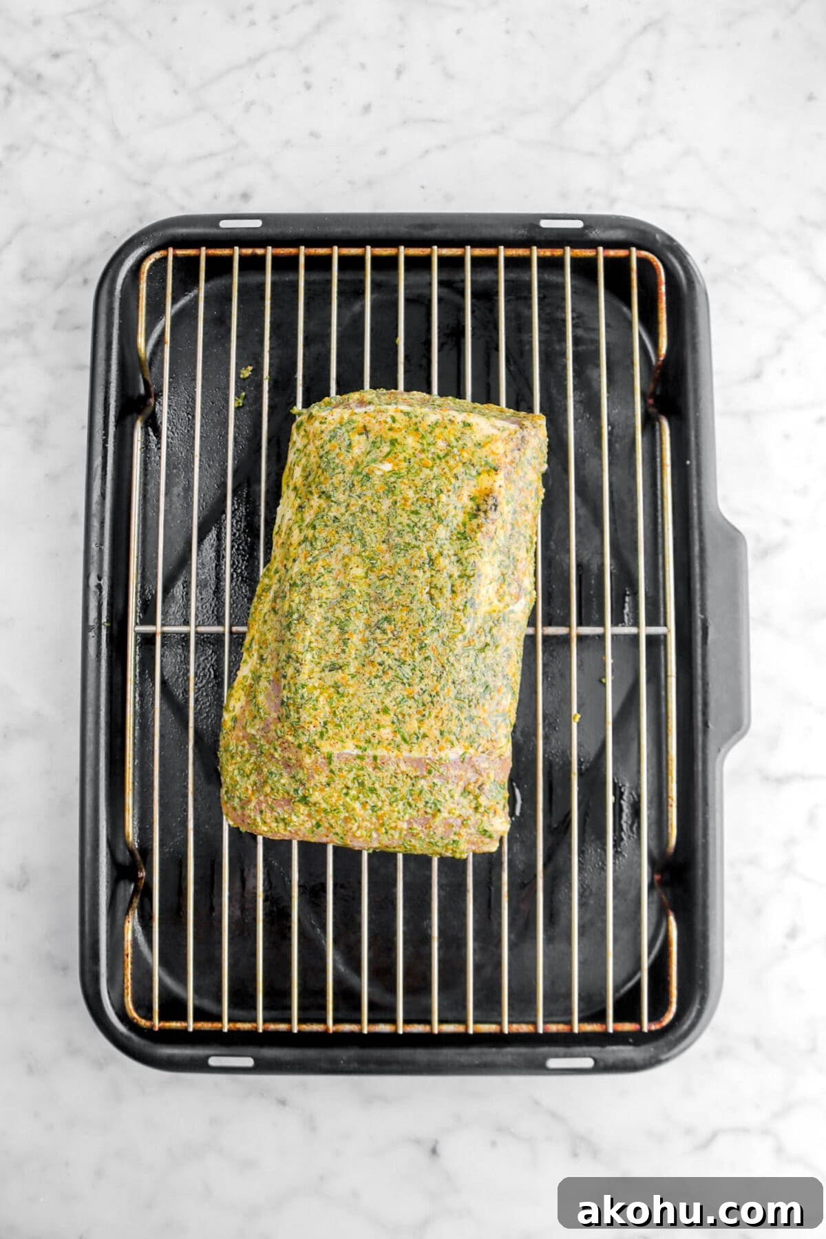 pork loin on roasting pan.