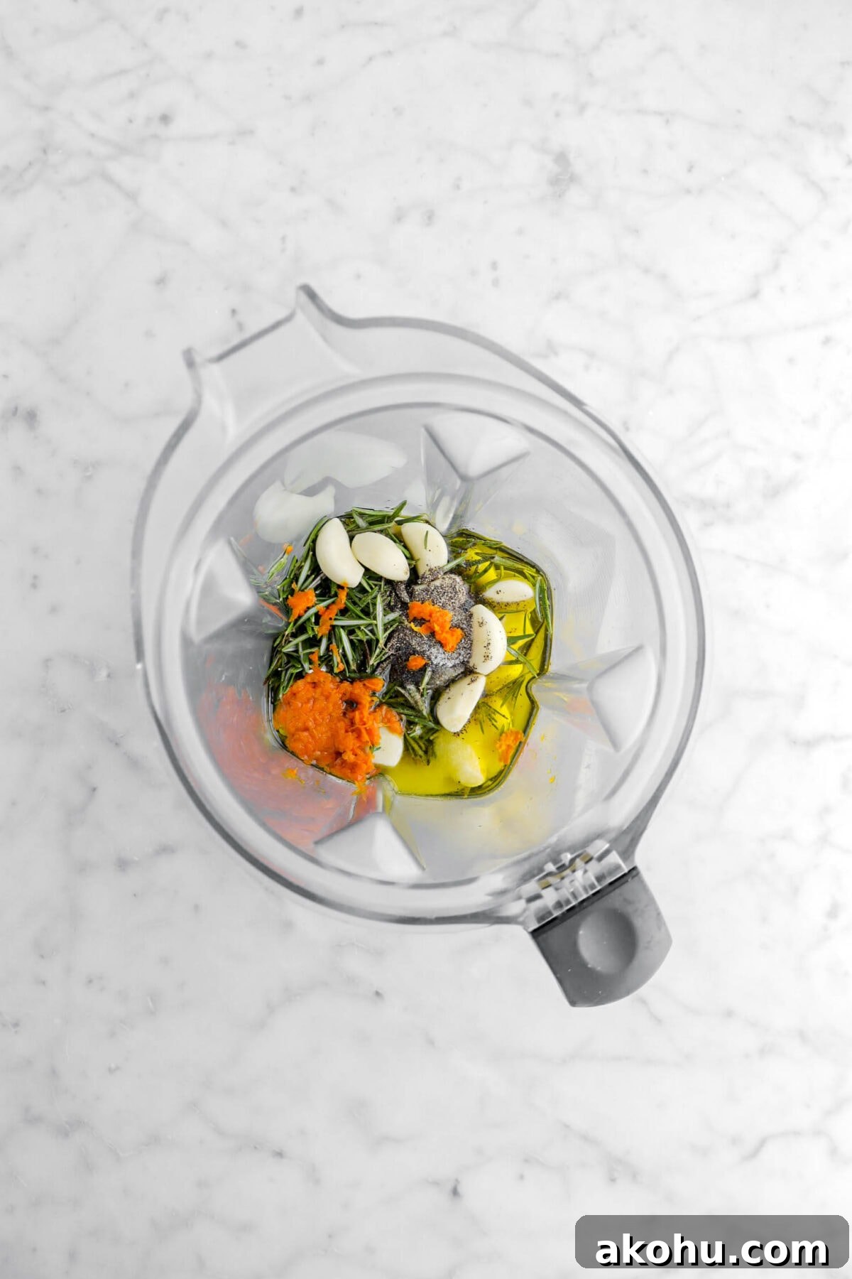 rosemary, orange zest, garlic, olive oil, salt, and pepper in blender.