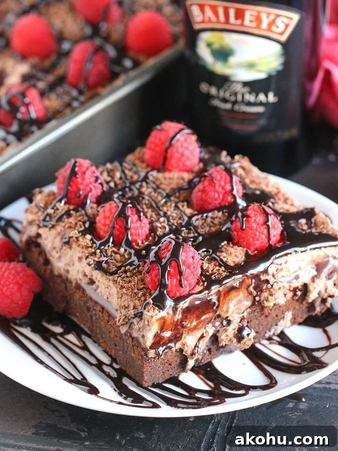 Chocolate Baileys Poke Cake Recipe 21 This delicious Chocolate Baileys Poke Cake has Baileys in the batter and in the chocolate sauce, topped with Baileys Chocolate Whipped Cream!