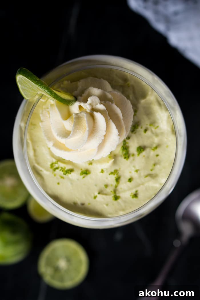 No-Bake Keto Key Lime Cheesecake Recipe 7 Overhead shot keto key lime cheesecake with whipped cream