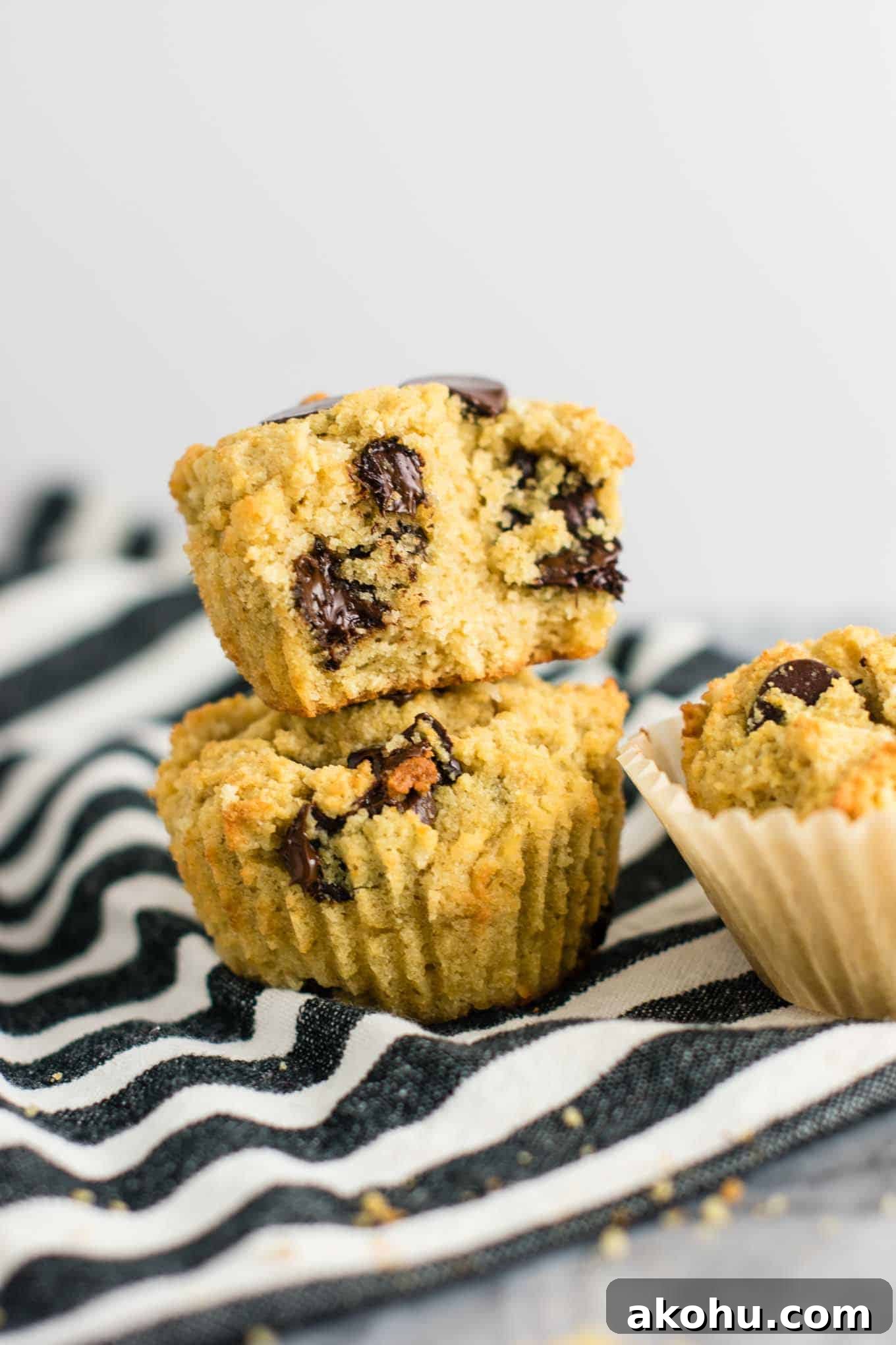 Fluffy Gluten-Free Chocolate Chip Muffins 2 Gluten free chocolate chip muffins (dairy free) Made with coconut flour and oat flour and naturally sweetened! #breakfast #glutenfree #chocolatechipmuffins #glutenfreedairyfree #dairyfree