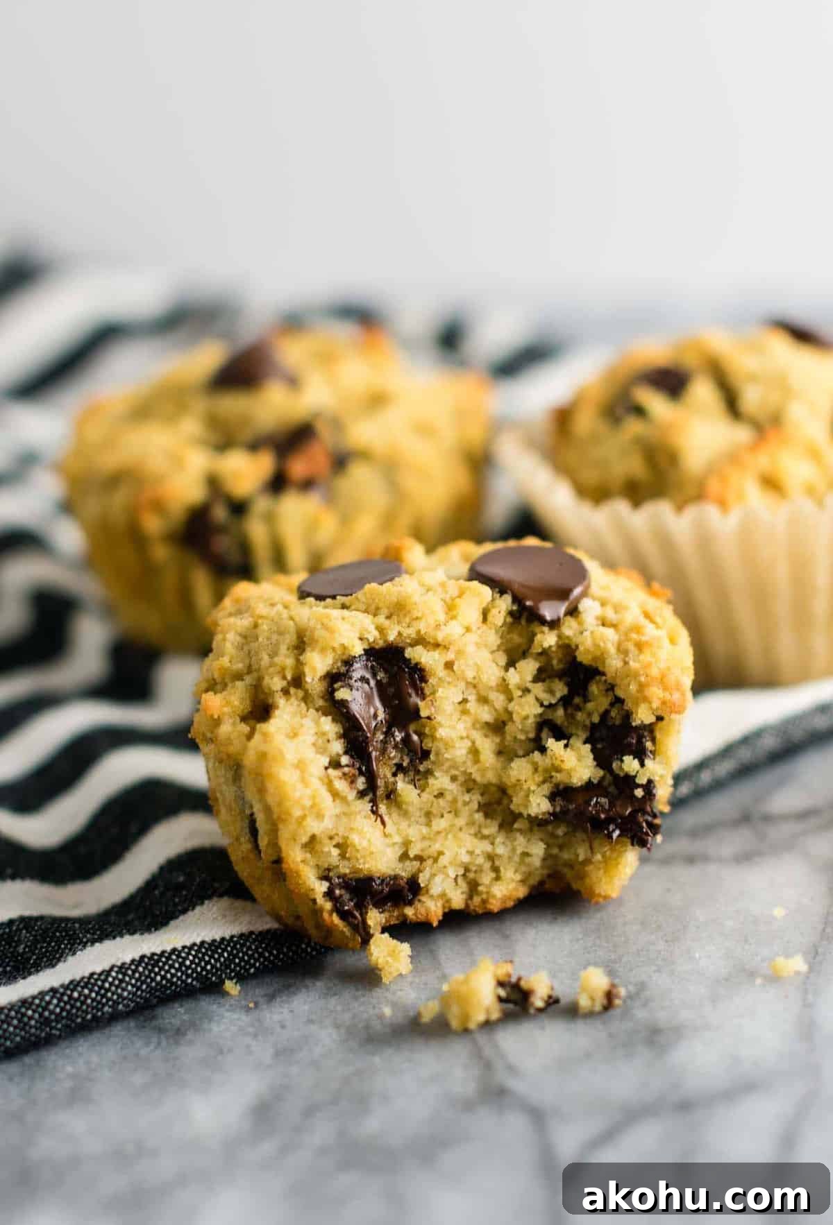 Fluffy Gluten-Free Chocolate Chip Muffins 5 Gluten free chocolate chip muffins (dairy free) Made with coconut flour and oat flour and naturally sweetened! #breakfast #glutenfree #chocolatechipmuffins #glutenfreedairyfree #dairyfree