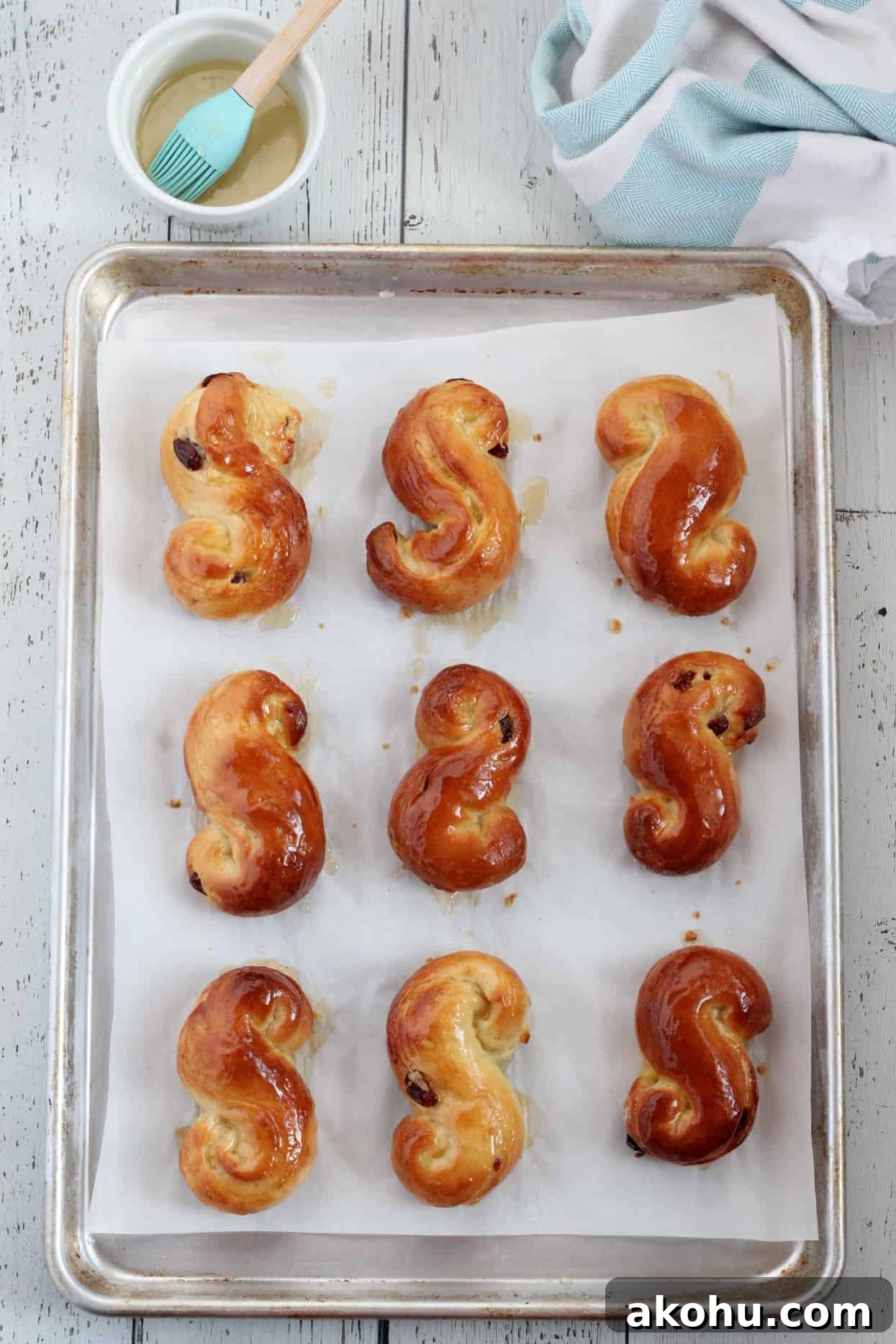 Easter Brioche Buns: Judas Ropes Recipe 4 baked pastry on baking sheet